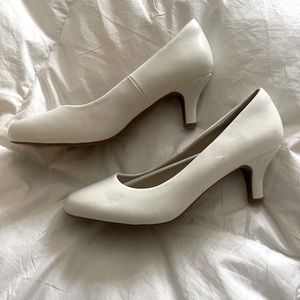 NEW white pump heels leather. New with small scuffs from other shoes in closet